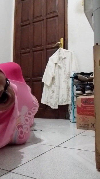 Emotional moment from "Hello Kitty Swimsuit Hogtied Hijab"