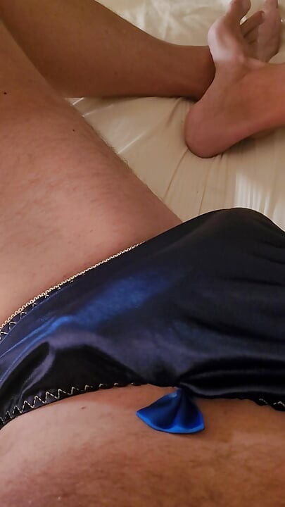 Masterbating in blue silk panties.
