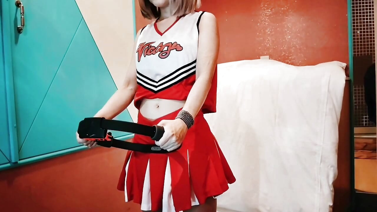 A cute busty married woman exercises 2 in a sexy cheerleader costume. Home made amateur Private Shoot