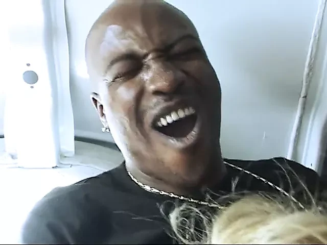 Bald black stud shoves his huge dick in blonde whore’s ass