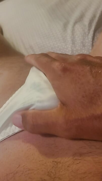 Sissy cums in his white satin panties.