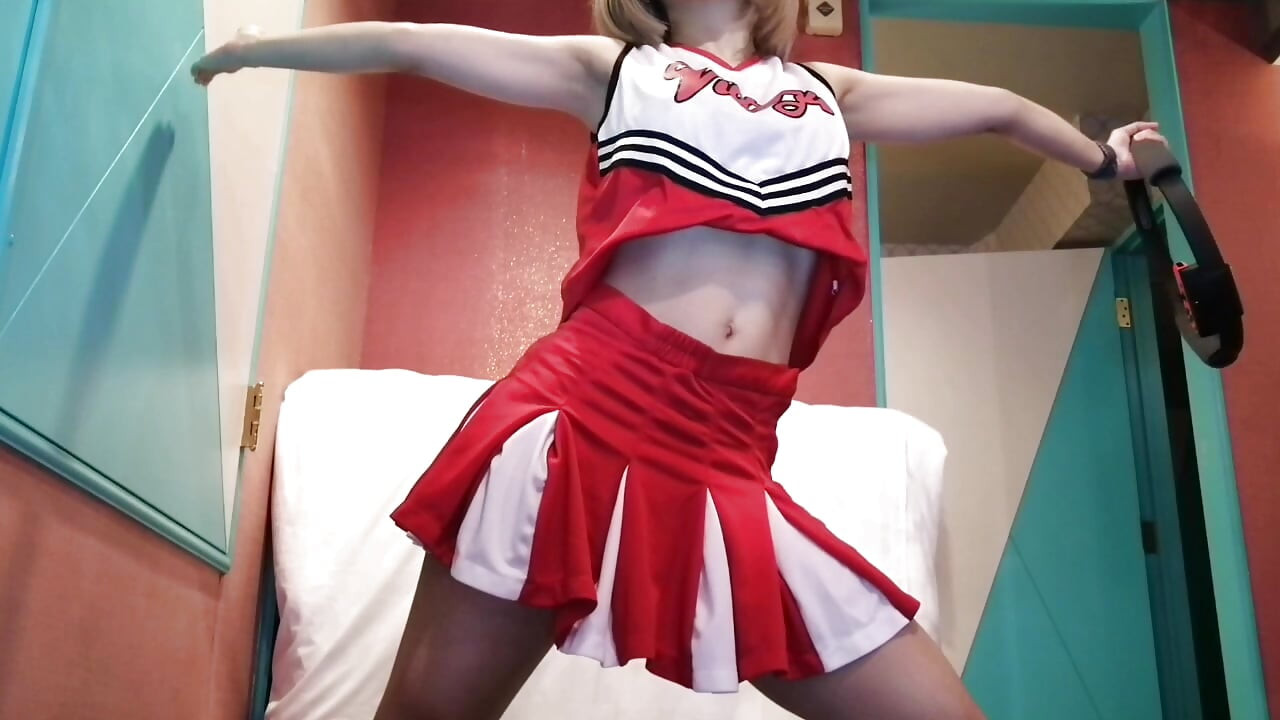A cute, busty married woman does five exercises in a sexy cheerleader costume. Peeking down from below. Home made amateur Private Shoot