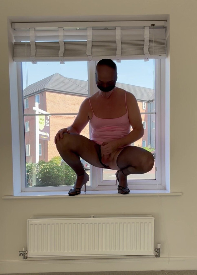 Slut fag sissy wanking in the window