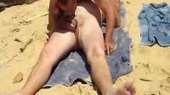 nat invites a guy at the beach to give nat a headjob