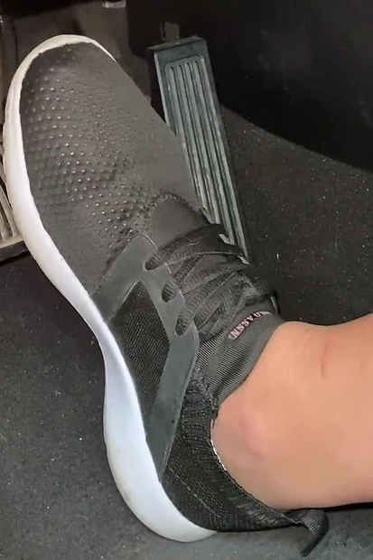 Pedal Pumping in Tennis Shoes by Ivys Feet