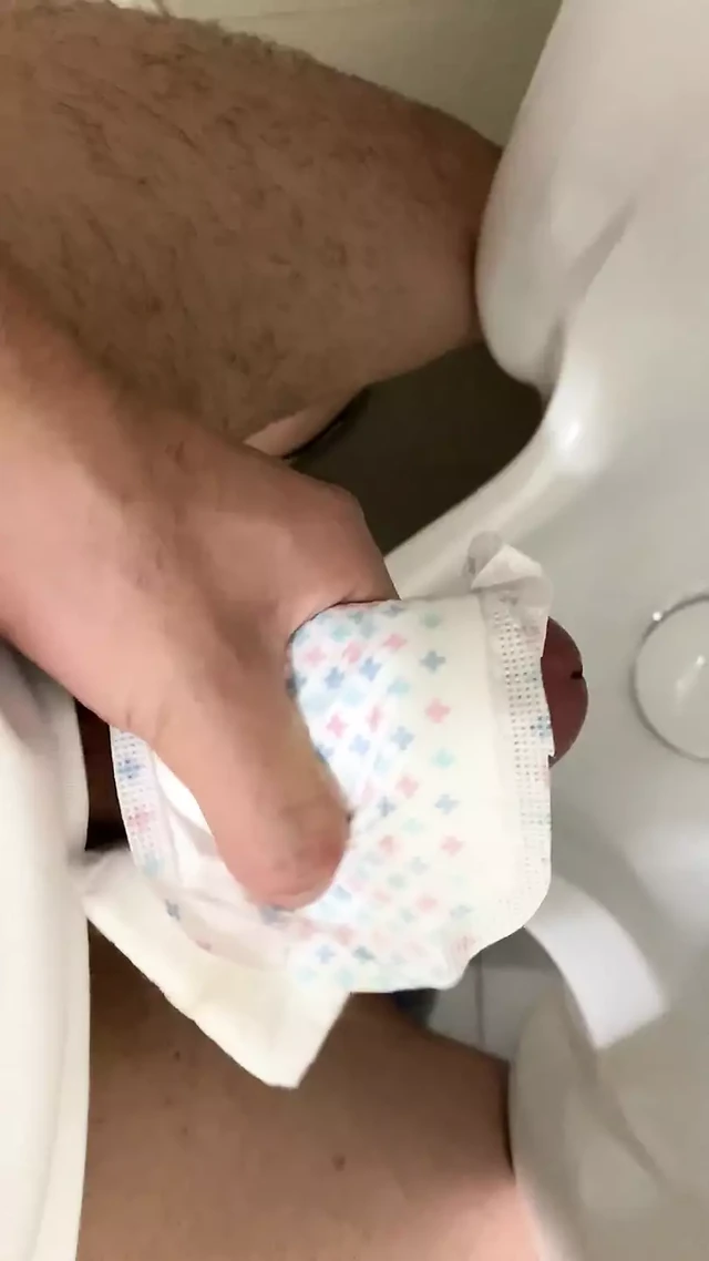 Cumming on the Sanitary pad in public toilet