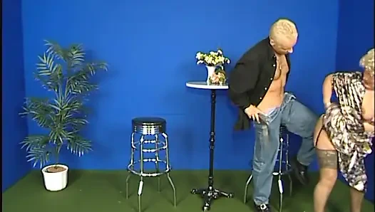 Mature bitch gets on two cocks, one by one