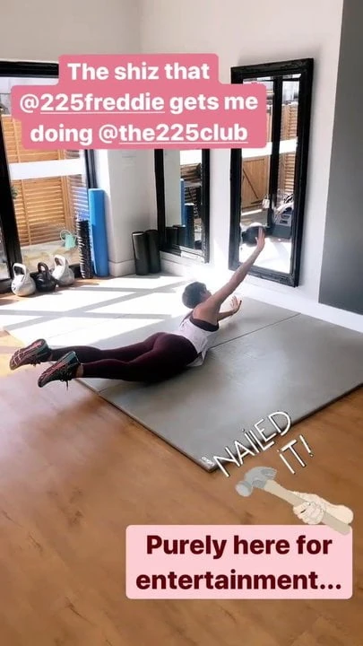 Frankie Bridge working out on the floor