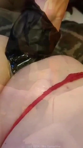 Iconic moment from "Mrs Samantha uses her High Heels and Fist on Sloerie Els for anal pleasure"