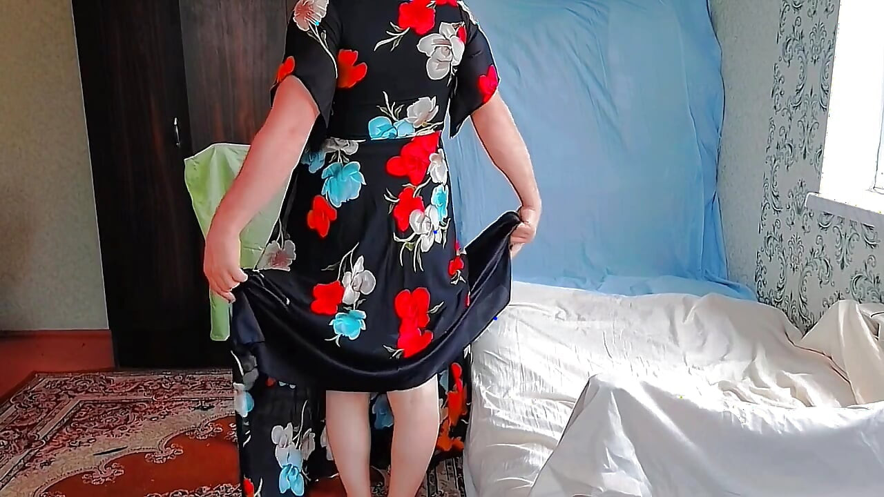 Gorgeous shemale holding heart-shaped balloon playfully