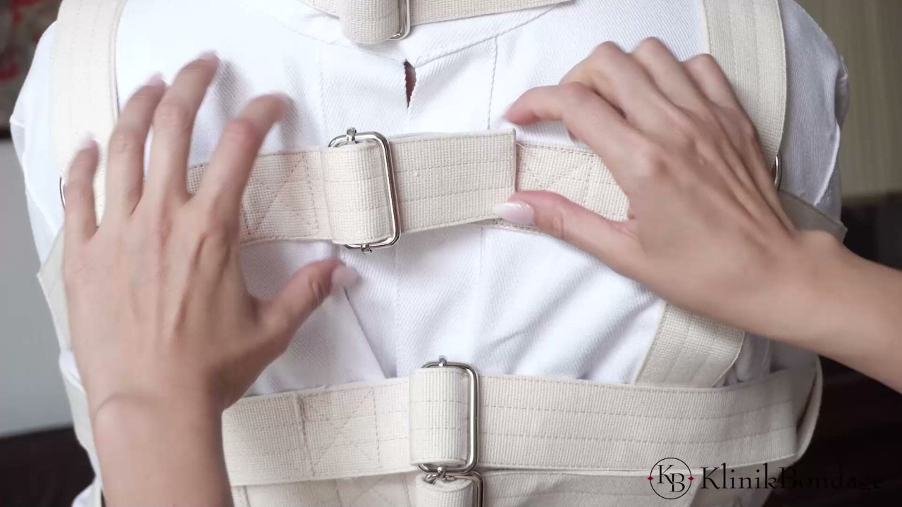 Buckled Tight Into Her Canvas Harness Strap By Strap