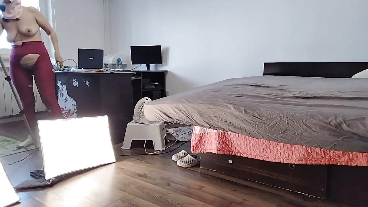 Sexy Latina Having Fun Trying on Clothes and Cutting Them.