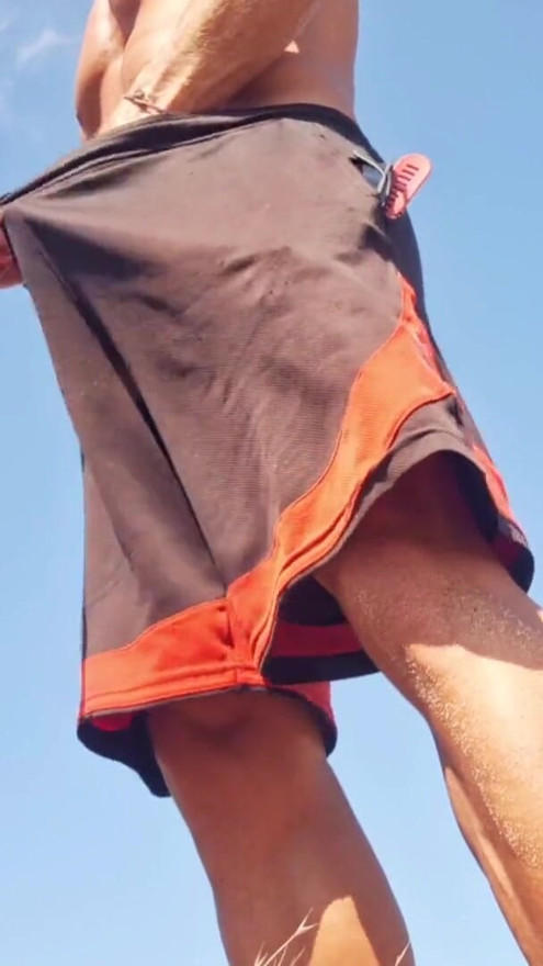 Perverted man masturbates his beautiful dick in a public beach | Clip 1