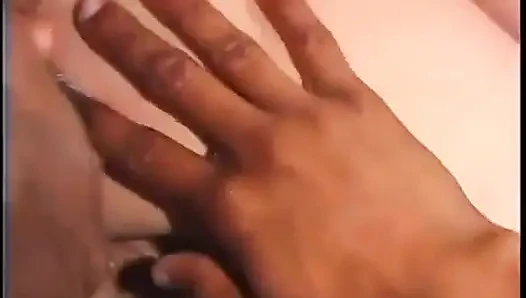 Black dude leans back so b-cup brunette can suck his huge cock and balls