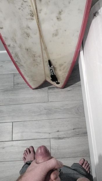 Giving the final waxing to my wife's board like she told me