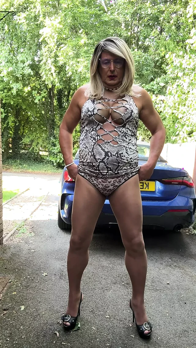 Sexy Crossdresser kellycd2022 in white animal print dress pantyhose and heels
