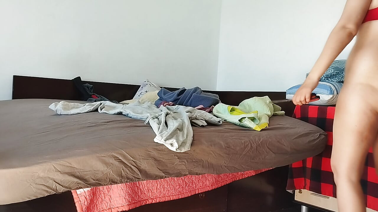 Amateur wife enjoys trying on clothes and cutting them. Amateur wife vacuums naked in the house.