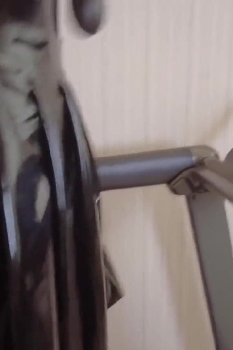Mz24 - a Girl Bound to a Treadmill with Metal Restraints and Shackles