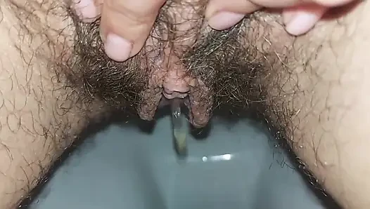 She Peed and Wiped Her Wet, Hairy Pussy