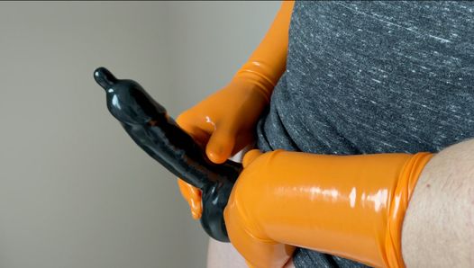 Cumshot With Latex Gloves And Cock Sheath