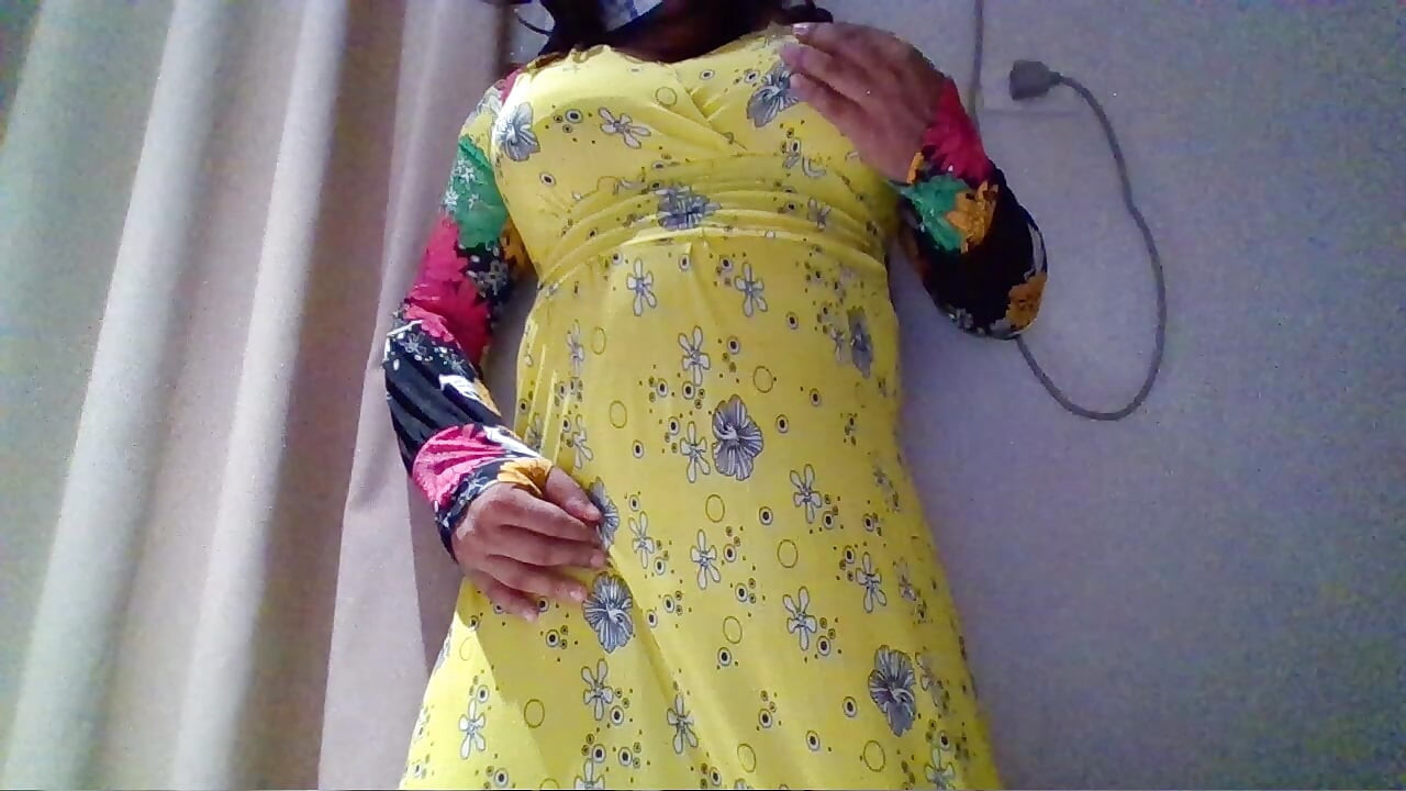 Crossdresser in a maxi gown ........... ...........