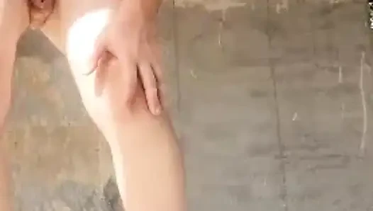 Boy nude in in an abandoned building
