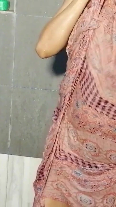 Captivating moment from "Indian Actress Miya Lust of Love Bathing Time with fabric big boobs with wet pussy in shower"