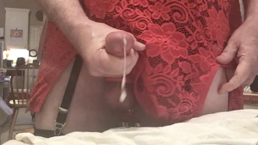 Crossdresser in stockings beats a load out of his dick and balls