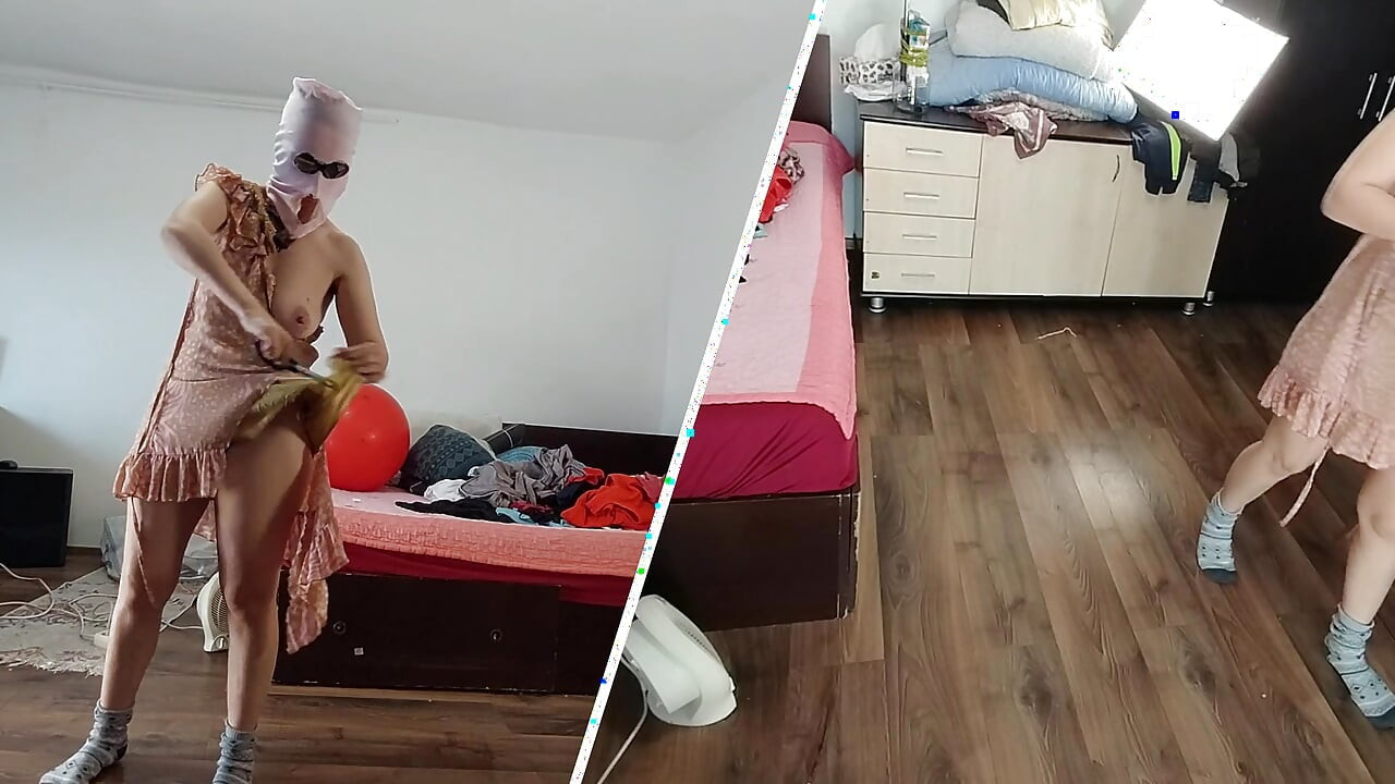 Amateur wife dancing naked at home. Amateur woman has fun trying on clothes and cutting them.