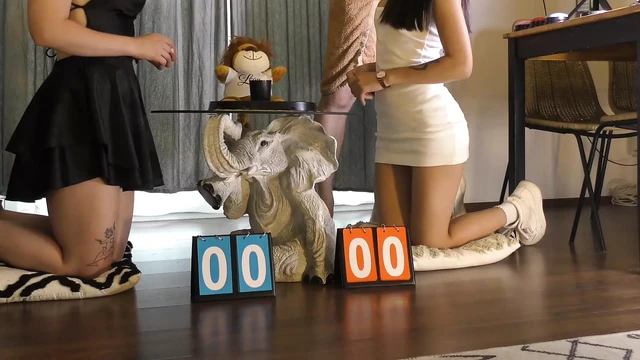 Two hot beautiful horny girls try to make a big cock guy cum with a dice challenge double handjob game