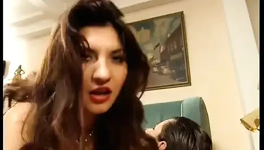 Omg! Busty Brunette in Latex Gets Fucked by Two Guys on Couch