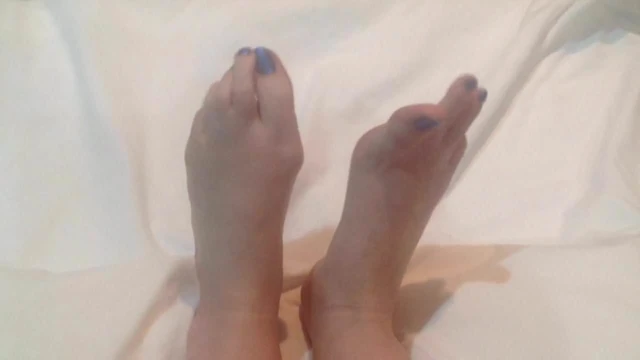 Feet on a White Sheet
