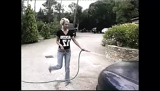 Amazing Blonde with Huge Tits Touches Her Tight Pussy While Washing the Car
