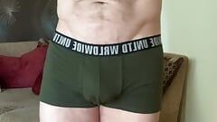 Task Borrow apprentices boxers and sport shorts and model them