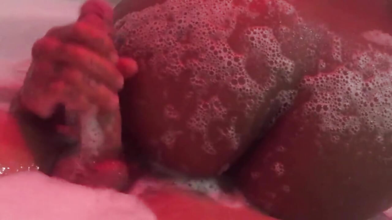 Eating brunette's big ass in the bathtub