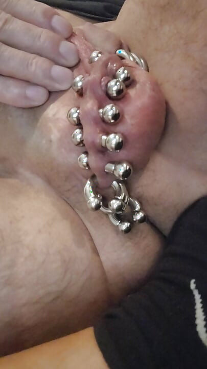 Ball piercings stretching