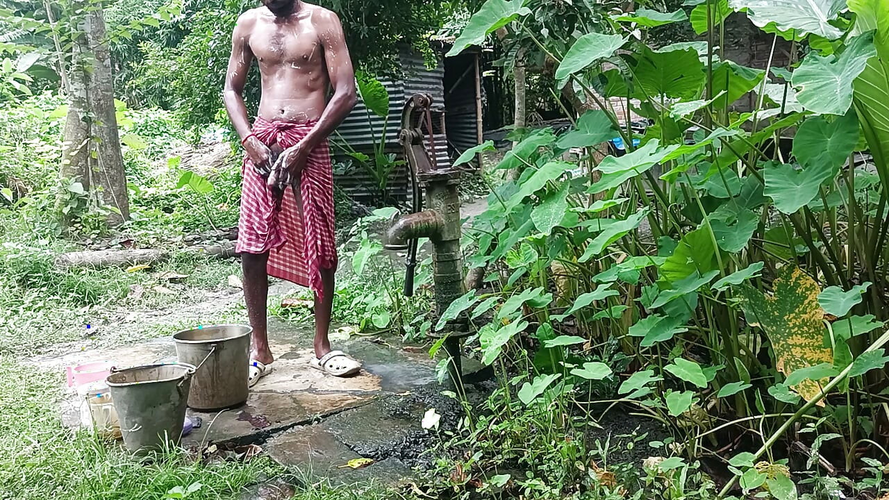 Tha naked Indian mature man shower in open place and showing body and dick..