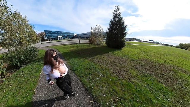 Crossdresser flashing boobs by the side of a busy highway