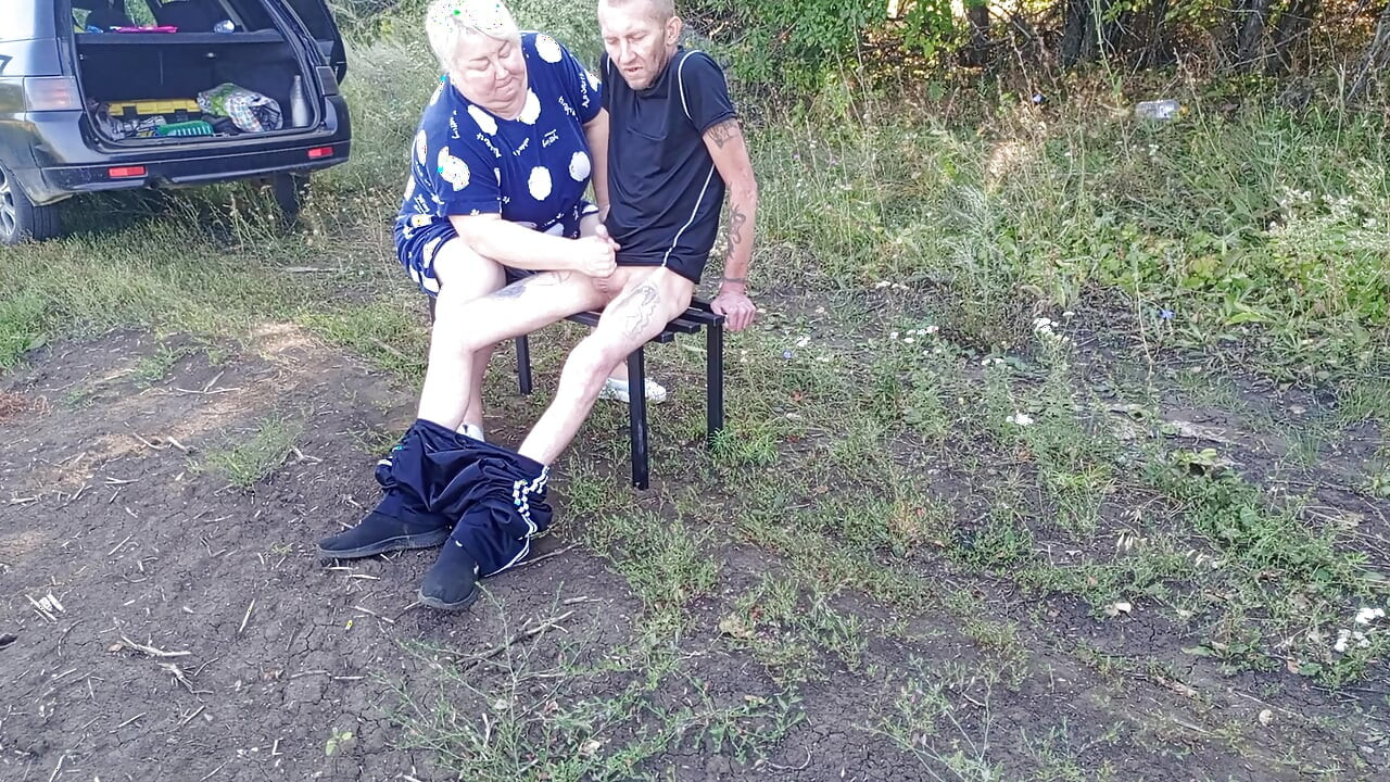 Stepmom in a public park jerks off my dick until I cum
