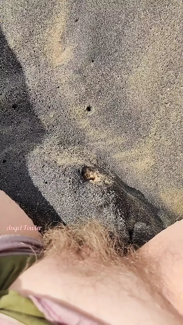 Girl Pissing on the Sea Beach