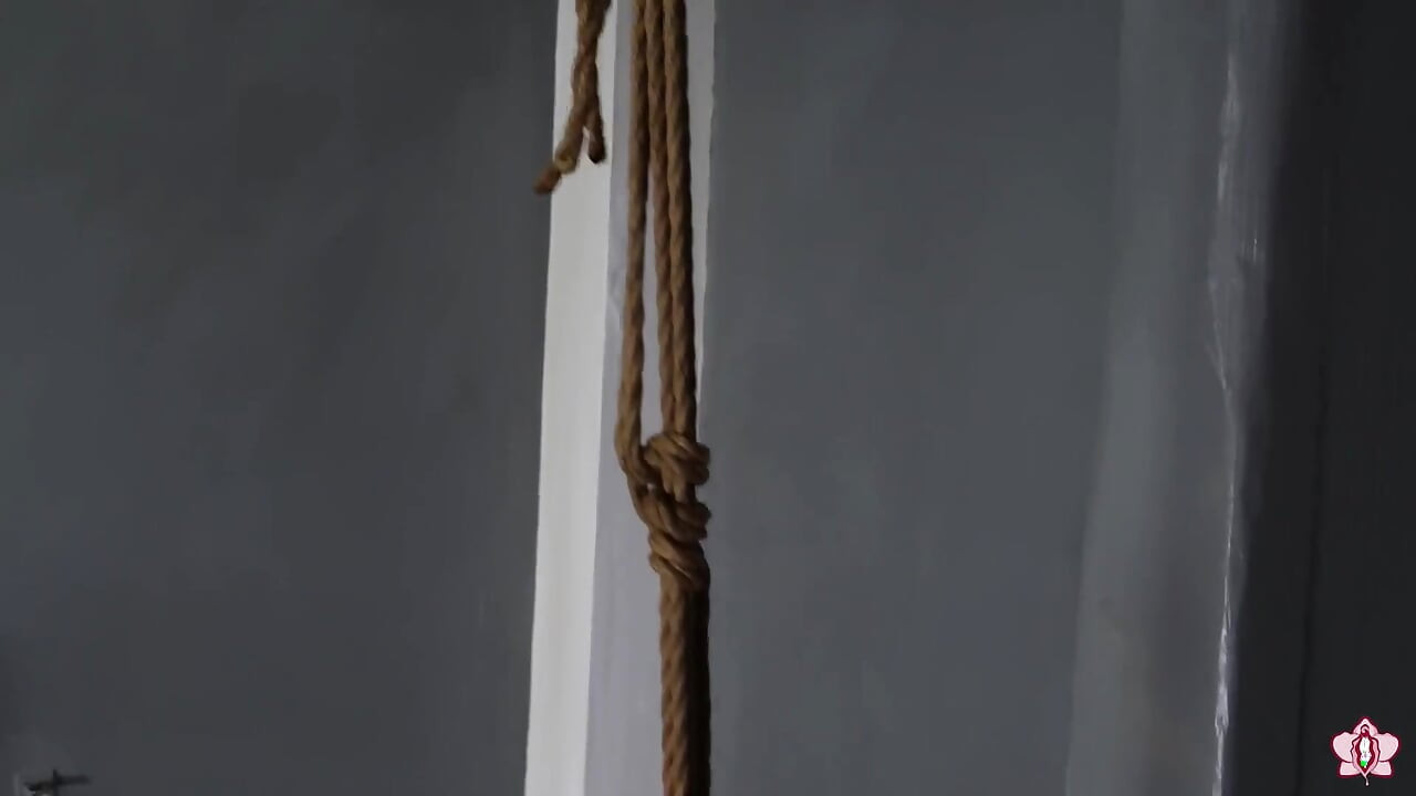 Hanging by Her Ankles From Rope Bondage, Slave Mila Can't Escape the Wand Attached to Her Swollen Pussy