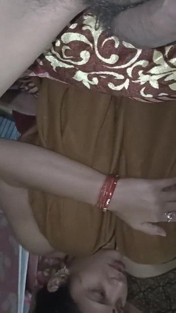 Stunning moment from "My horny wife Shalini seduced and riding dick in her periods in night time"