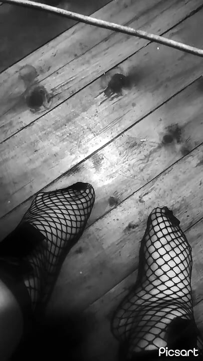 Teen in fishnet socks