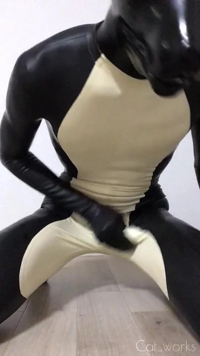 Latex Catsuit Dog Handjob With Ball Gag Inside