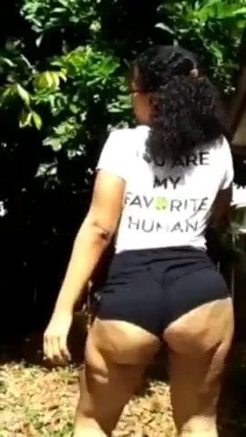 THICK ASS REDBONE MILF TEASING IN HER BACKYARD
