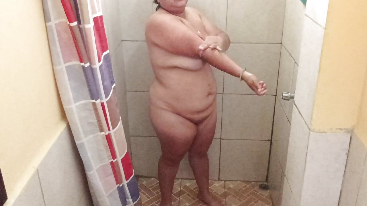 Taking a shower in a public restroom.