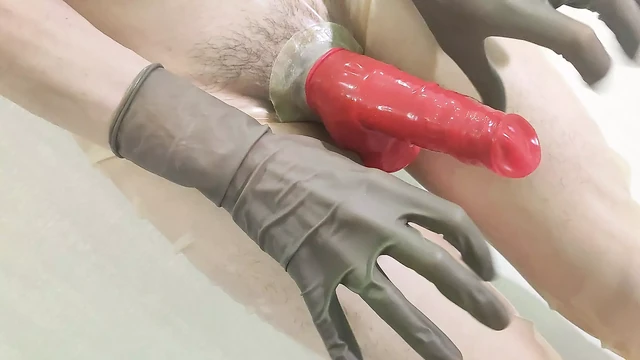 Red double-layered latex cock