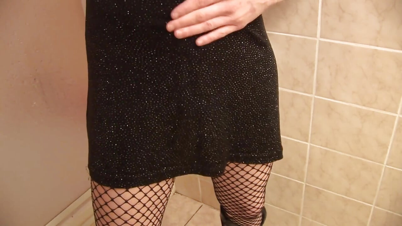 Pissing action in the bathroom with brunette