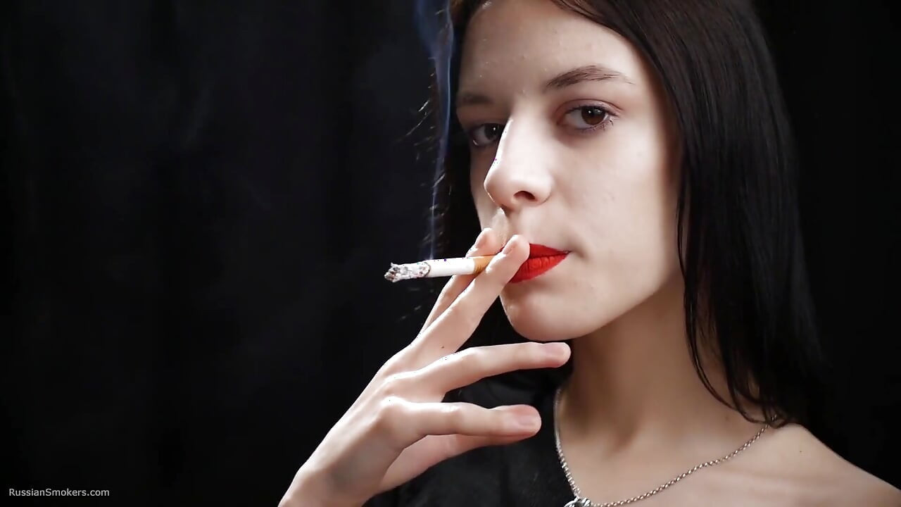 Slim Chick Is Smoking Two Reds