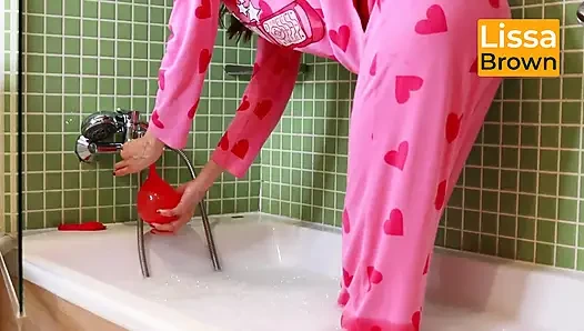 Rosa Pijamas im schaumbad und Ballon